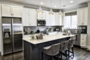 White cabinets paired with soothing earth colors make this kitchen inviting.